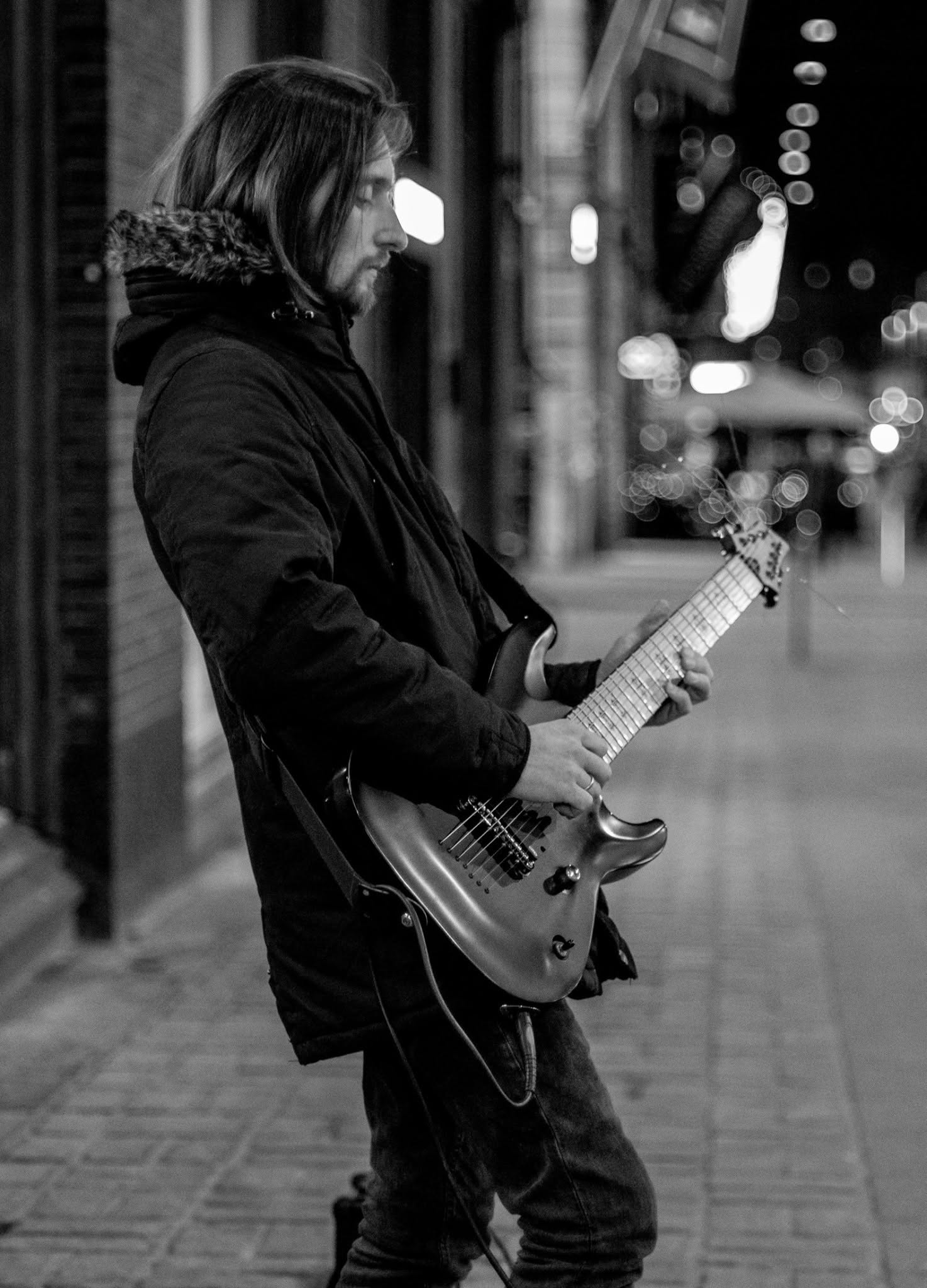 Black and white street guitarist