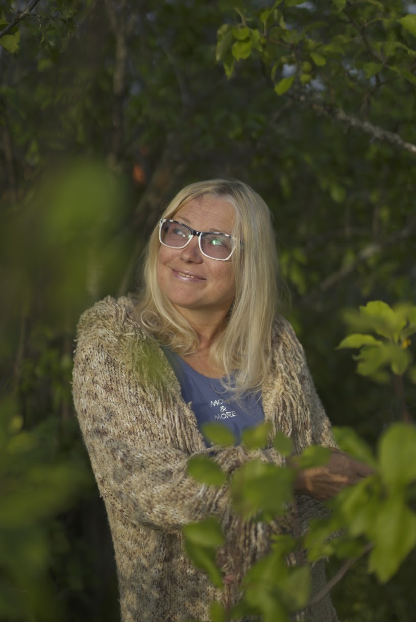 Portrait of a woman in greenery