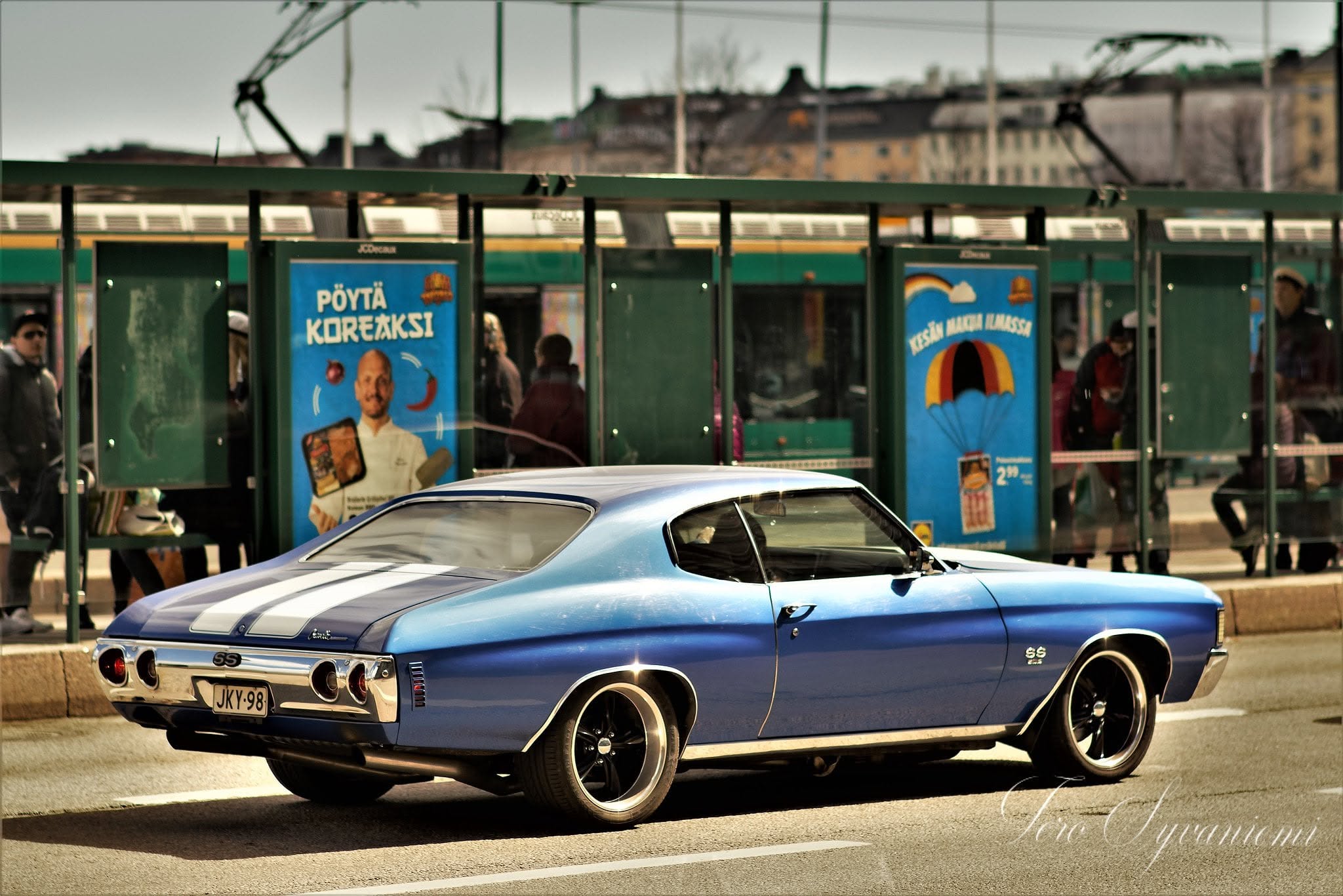 Blue Chevrolet Chevelle SS at a Helsinki bus stop